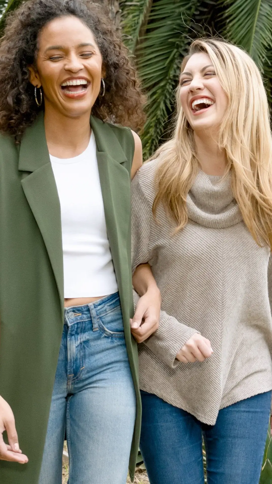 Two women smiling outdoors